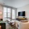living room with couch chairs and tv EDE downtown Frederick MD apartments