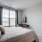 bedroom bed and desk EDE downtown Frederick MD apartments