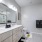 bathroom sinks toilet and glass enclosed shower EDE downtown Frederick MD apartments