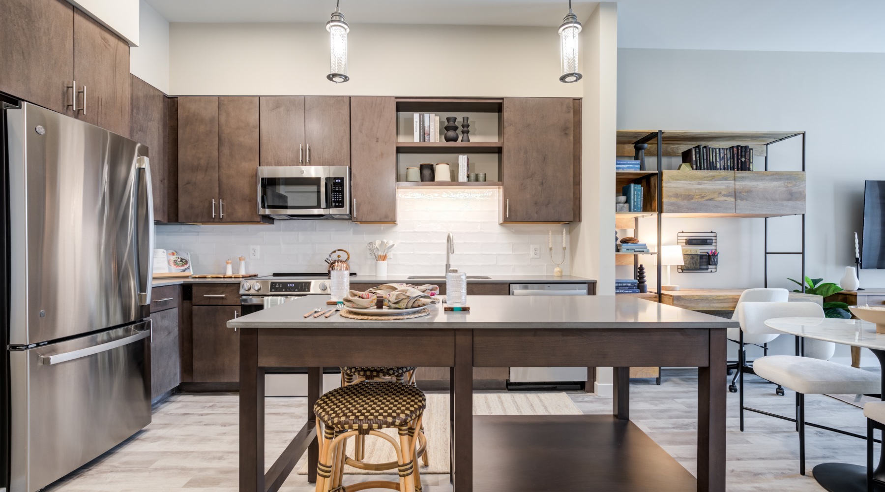 kitchen with stainless steel appliances and island EDE downtown Frederick MD apartments